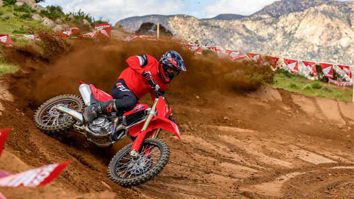 CRF450R dynamic shot on track with MX rider