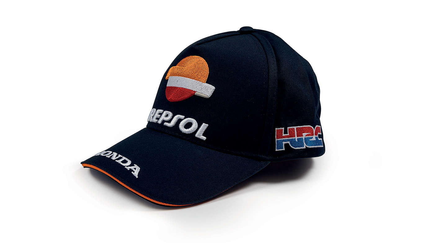 Kappe mit Honda MotoGP-Teamdesign und Repsol-Logo in Blau.
