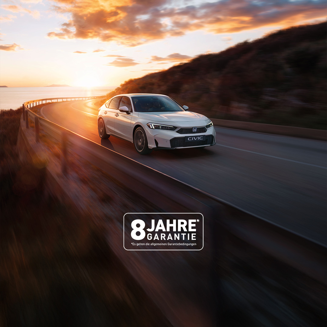 Honda Civic Hybrid driving on a highway