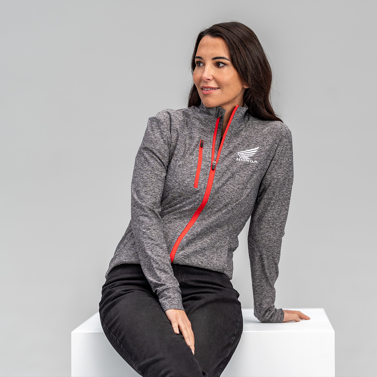Damen-Sweatjacke in grau meliert und orangenen Akzenten